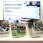 Prospektständer auf Messetheke